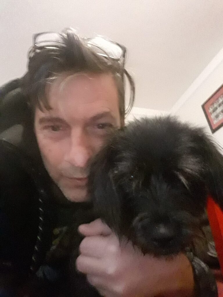 HIFU focal therapy patient holding his dog